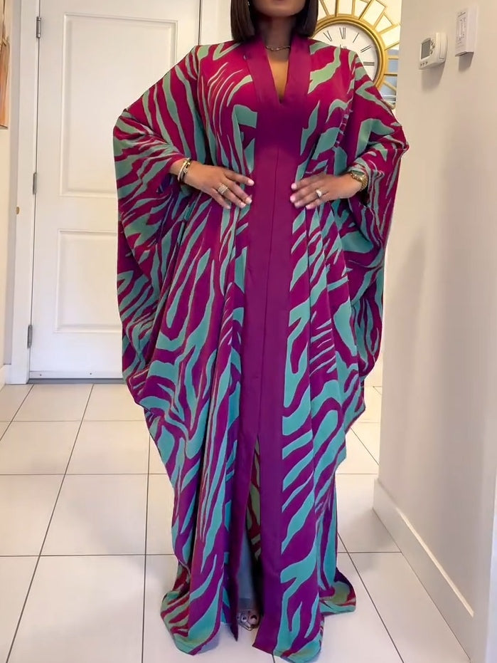 Lyra – sukienka maxi w zebry